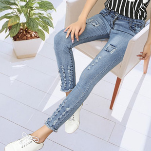 2015爆款磨破洞牛仔九分裤女春秋小脚裤显瘦